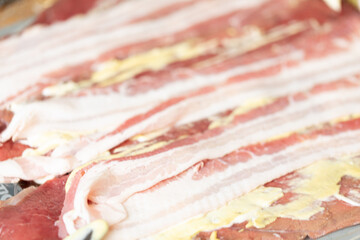 Raw meat texture background closeup bacon.