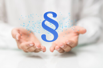 paragraph law sign digital in hand.