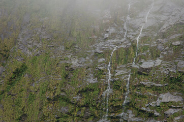 Waterfalls in Fiordland National Park. Southland. South Island. New Zealand.