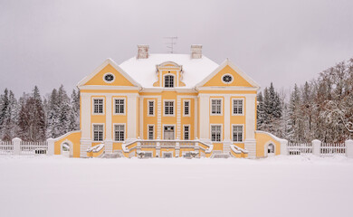 old manor in winter time, europe, estonia
