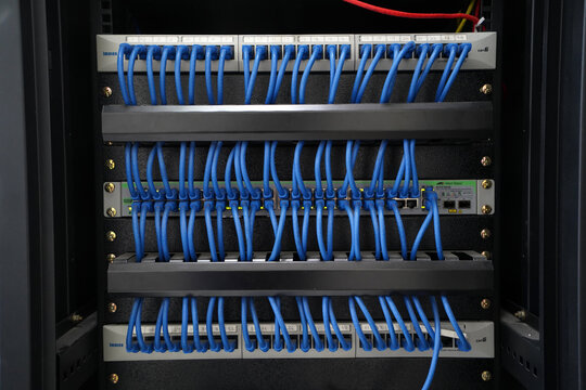  cat6 patch cord cables going from patch panel to 48 port network switches.