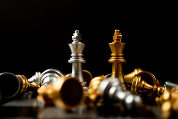 Golden and Silver King chess is last standing in the chess board, Concept of successful business leadership, Confrontation and loss
