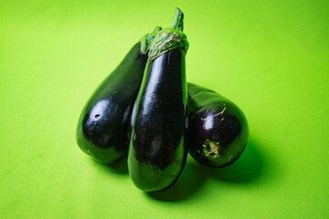 bright eggplant on green background