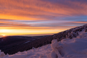 majestic sunset in the winter mountains landscape, kralicky sneznik in czech republik. europe