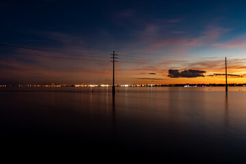 Fototapeta premium Calm water sunset over the river