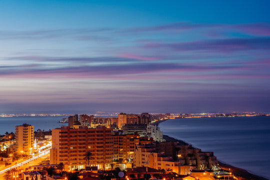 Beautiful view of Mar Menor sea and the Mediterranean Sea at night in San Javier, Murcia, Spain