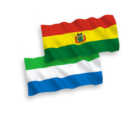 Flags of Bolivia and Sierra Leone on a white background