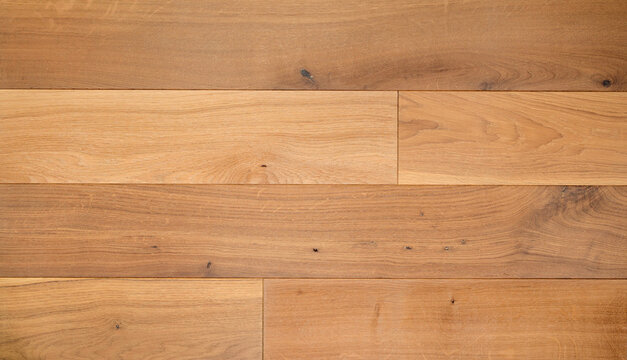 Light brown wooden parquet panels texture background