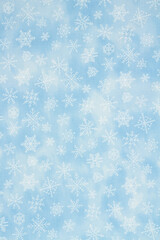 Blue snowflake background for winter or holiday backgrounds