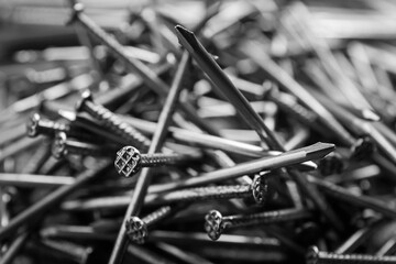Pile of metal nails as background, closeup