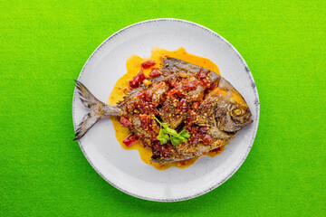 Deep fried pomfret fish and chili sauce