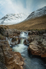 Fototapeta na wymiar the waterfalls in glen etive near rannoch moor and glencoe valley in the argyll region of the highlands of scotland during winter
