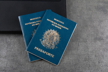 Brazilian passport on gray background with copy space