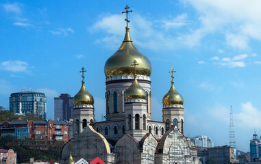 Cityscape with a view of the building of the temple under construction. © vvicca