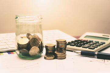 financial accounting analytics document report paperwork progress growth graph with money and chart on table with pen keyboard and calculator work for business planning.