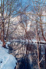 Winter landscape on the river in Reda