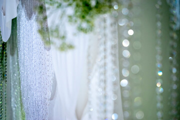 Silver pearl curtain blur abstract bokeh background