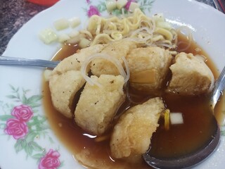 Pempek or empek-empek is a fish cake with spicy and sour vinegar sauce. typical Indonesian food from Palembang