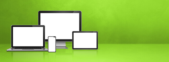 computer, laptop, mobile phone and digital tablet pc. green banner
