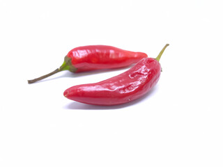 Closeup shot of red hot chilies isolated on a white background