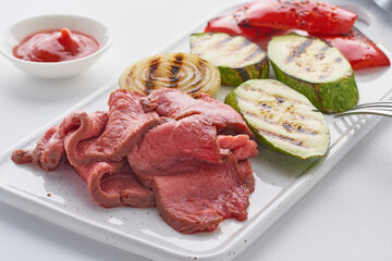 Sous vide cooked and seared beef fillet steak with vegetables. Keto paleo dash diet for lost weight with low calories.