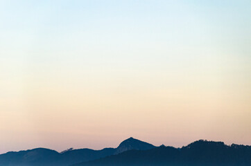 Fototapeta na wymiar Low angle view of mountains at dawn