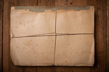 Old paper documents with a string bow