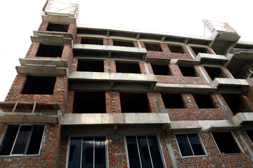 A under construction building and apartment with 4 floors and 1 ground floor