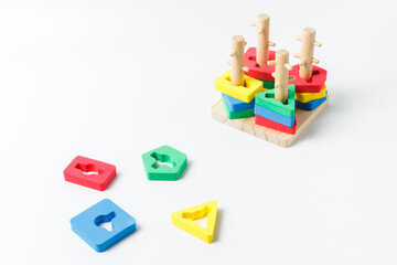 Children's logic game, puzzle. Colorful bright details, sorter. On a white background with space