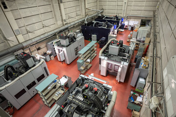 general view of the shop of a metalworking plant with cnc machines
