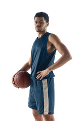 Unstoppable. Young arabian muscular basketball player posing confident isolated on white background. Concept of sport, movement, energy and dynamic, healthy lifestyle. Training, practicing.