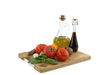 oil and tomatoes isolated on white background