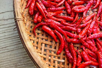 Dried red chillies in a basket