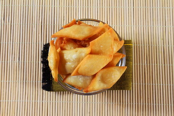 traditional homemade indian gujrati holiday sweet snack food shakkarpara or shankarpali