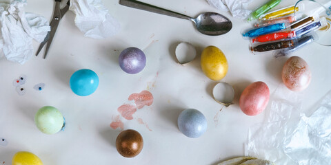 Colored easter eggs on paper gray background