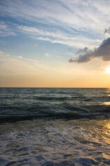 Amazing sea sunset, the sun, waves, clouds