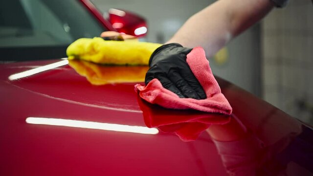 Car waxing and paint coating to prevent sun and heat damage or harsh UV ray on a car paint. Car wax also covering the surface car color to protection it from chemicals, erosion and oxidation