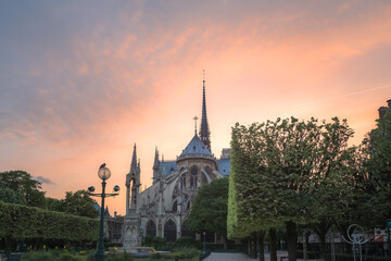 Fototapeta na wymiar A backside view of the famous Notre Dame Cathedral on Ile de la Cite in Paris, France at sunset