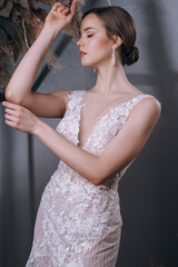 Fototapeta na wymiar young girl in a luxurious wedding dress