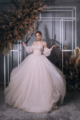 young girl in a luxurious wedding dress