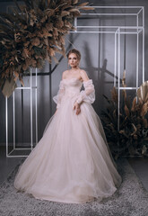 Fototapeta premium young girl in a luxurious wedding dress
