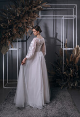 Fototapeta premium young girl in a luxurious wedding dress