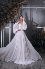 Fototapeta premium young girl in a luxurious wedding dress