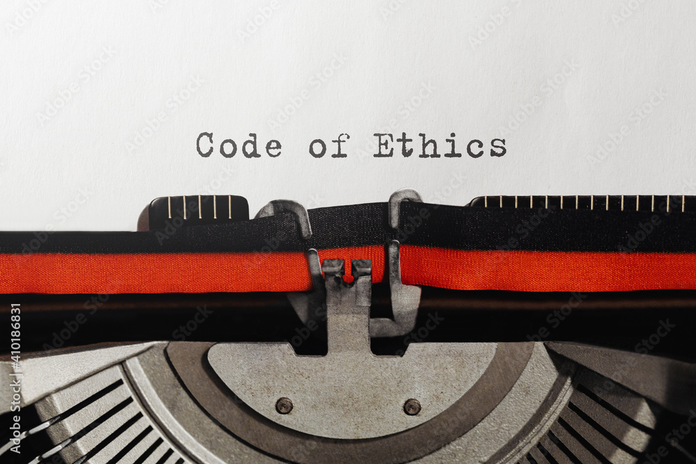 Poster text code of ethics typed on retro typewriter