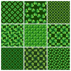 Green clover leaves seamless patterns set