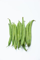Bunch of fresh green whole beans isolated on white background