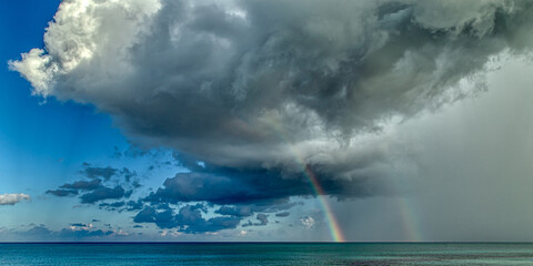 Storm with double Rainbow