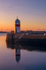 Fototapeta na wymiar Castletown lighthouse at sunrise