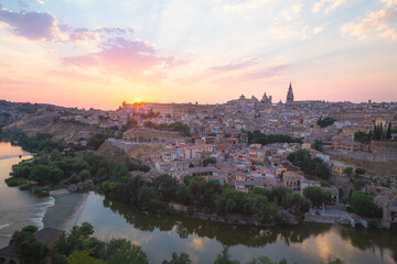 Fototapeta na wymiar View of the historic town of Toledo, Spain and the Tagus River at sunset