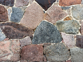 Bloki kamienne w starym murze.
